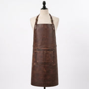 "Brown distressed leather apron with front pocket, displayed on a mannequin against a white background."