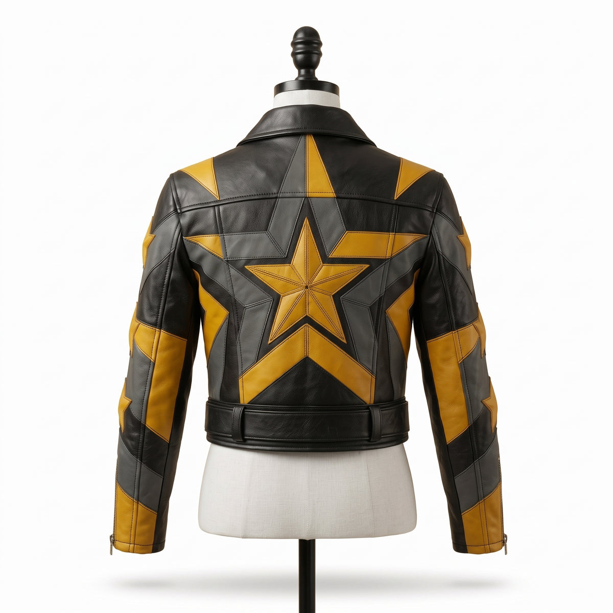 "Back view of a black leather jacket with bold yellow and gray star and lightning-bolt graphic panels, belted waist, displayed on a mannequin against a white background."