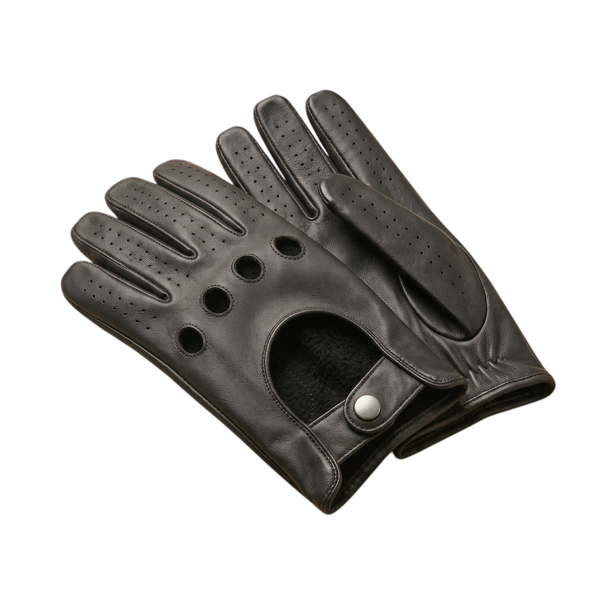 "A pair of black leather driving gloves overlapping diagonally, showing four circular ventilation holes, perforated fingers, and a snap-button wrist strap on a white background."