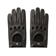 "A pair of black leather driving gloves laid flat side by side, each showing four circular ventilation holes, perforated fingers, and a snap-button wrist strap on a white background."