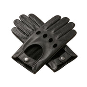 "A pair of black leather driving gloves crossed in an X shape, each showing four circular ventilation holes, perforated fingers, and snap-button wrist straps on a white background.