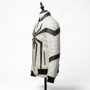 "Angled side view of a white leather bomber jacket with black spider graphic, web-pattern stitching, and black ribbed collar and cuffs, displayed on a mannequin against a white background."