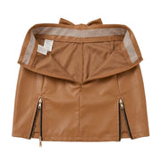 "Interior construction view of brown faux leather mini skirt showing waistband lining, care and size label tags, back zipper closure, and dual front zipper hem details."