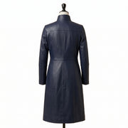 "Back view of a navy blue leather coat with a stand collar and fitted A-line silhouette, displayed on a mannequin against a white background."