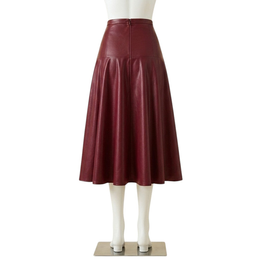 Back view of a maroon faux leather A-line midi skirt showing a centered zipper closure and paneled seams, displayed on a headless mannequin against a white background."