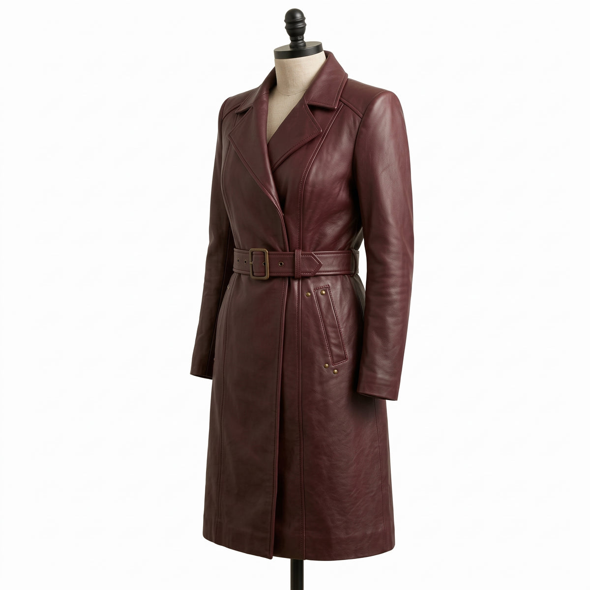 **"Burgundy leather belted trench coat, side angle view on mannequin"**