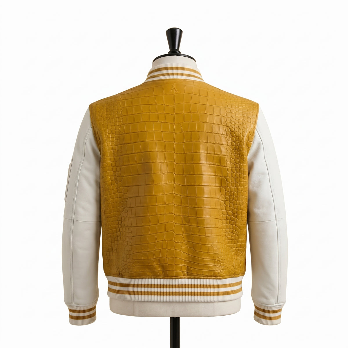 "Mustard yellow croc-embossed leather varsity jacket, back view"
