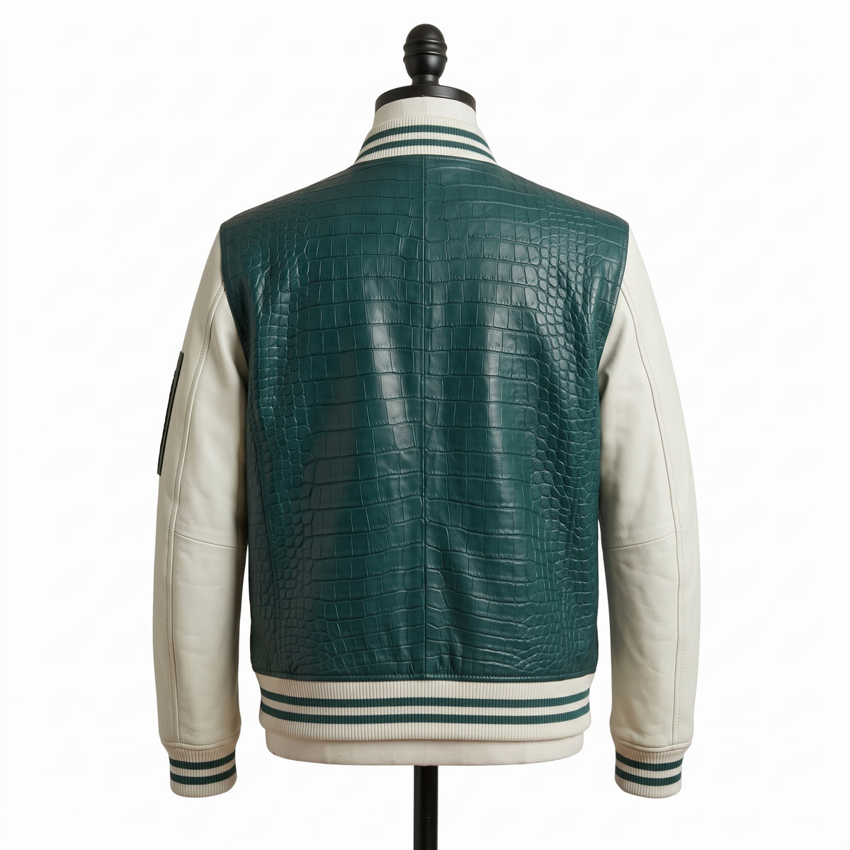 "Green croc-embossed leather varsity jacket, back view on mannequin"