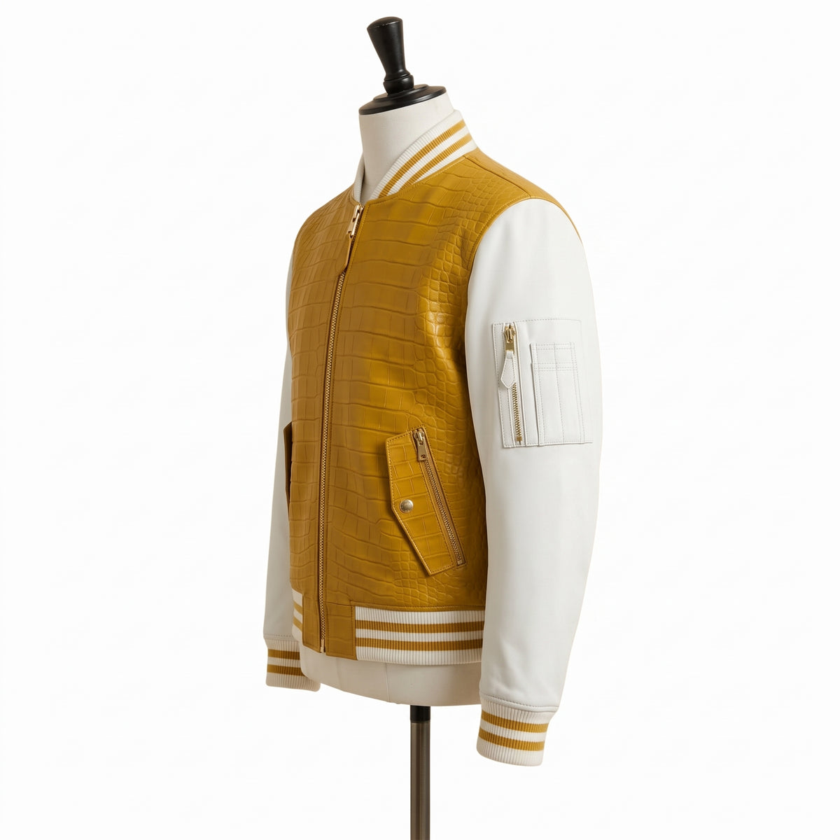 A yellow and white faux leather varsity jacket displayed on a mannequin torso against a white background.
