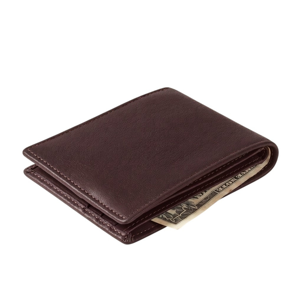 "Closed burgundy leather bifold wallet shown at an angle with a currency note peeking out from the side, on a white background.")