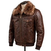 "Three-quarter angle view of a dark brown distressed leather bomber jacket on a mannequin, showing the fur collar, front zipper, button-flap chest pockets, and ribbed cuffs against a white background."
