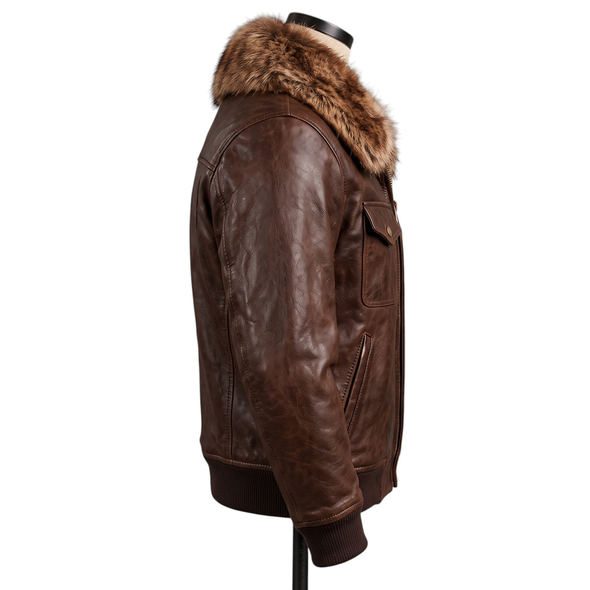 "Full side profile view of a dark brown distressed leather bomber jacket on a mannequin, showing the fur collar, chest and side pockets, and ribbed cuffs against a white background."