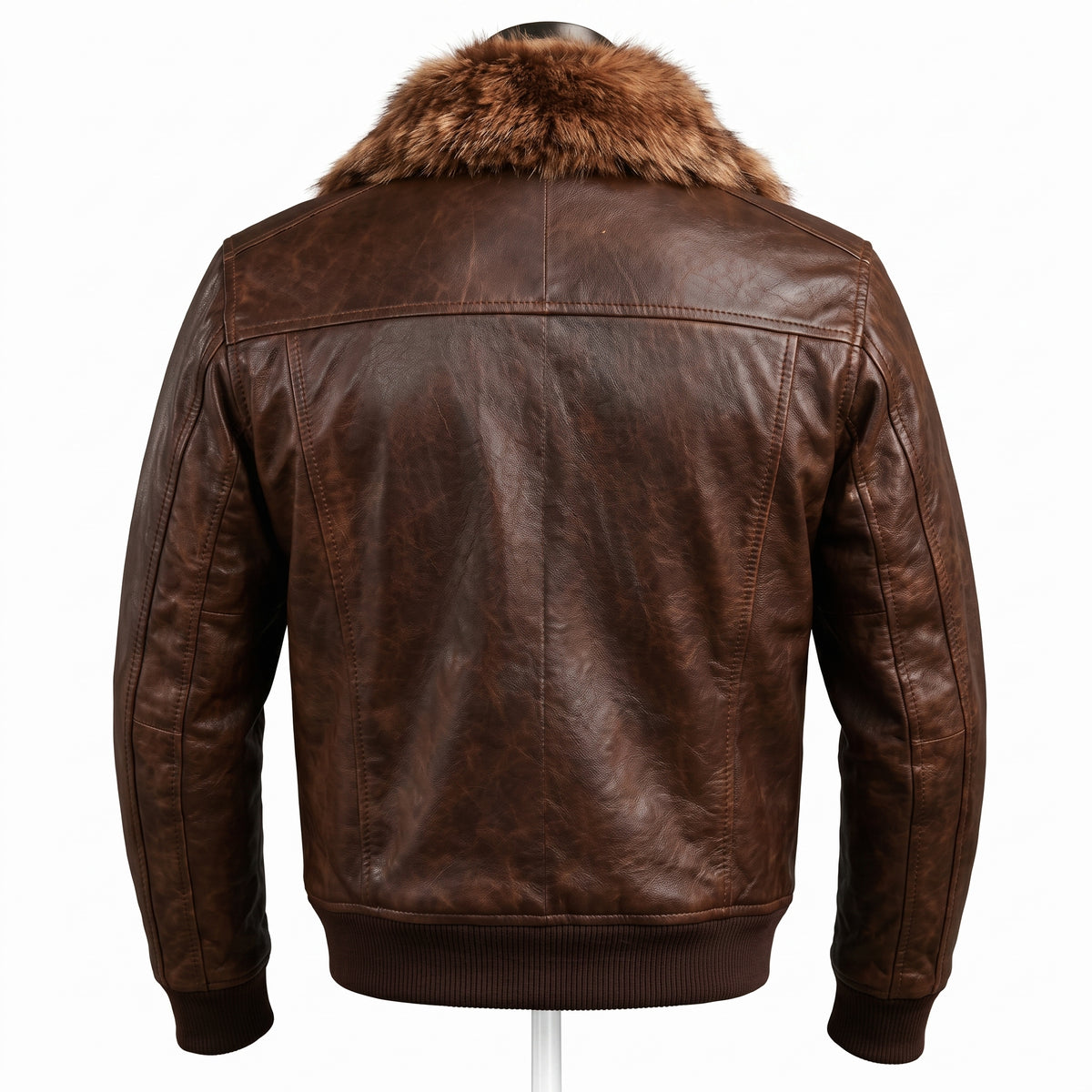 "Back view of a dark brown distressed leather bomber jacket on a mannequin, showing the fur collar, back panel seaming, and ribbed cuffs and hem against a white background."