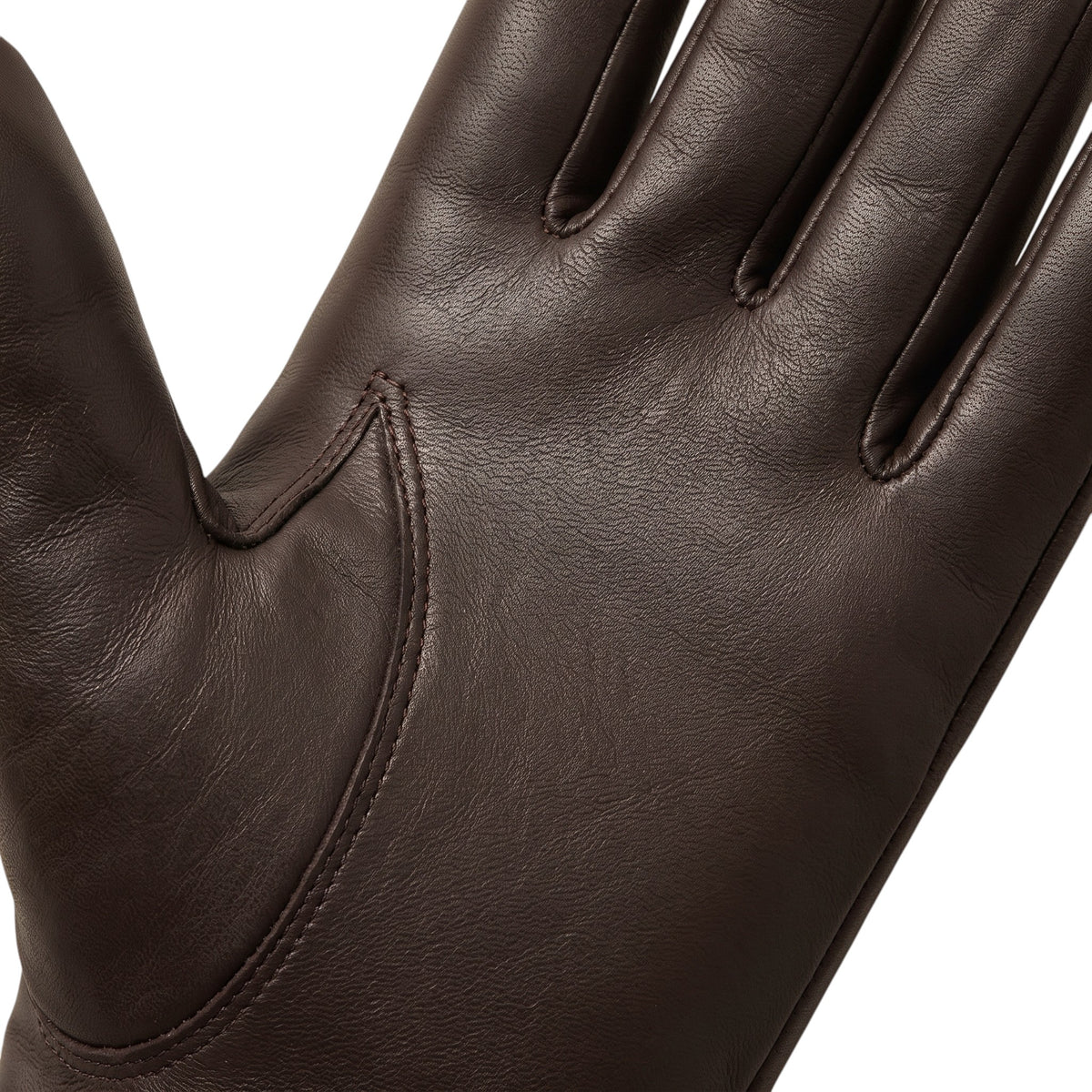"Extreme close-up of the palm and thumb gusset area on a dark brown leather glove, showing the leather grain texture and seam stitching."